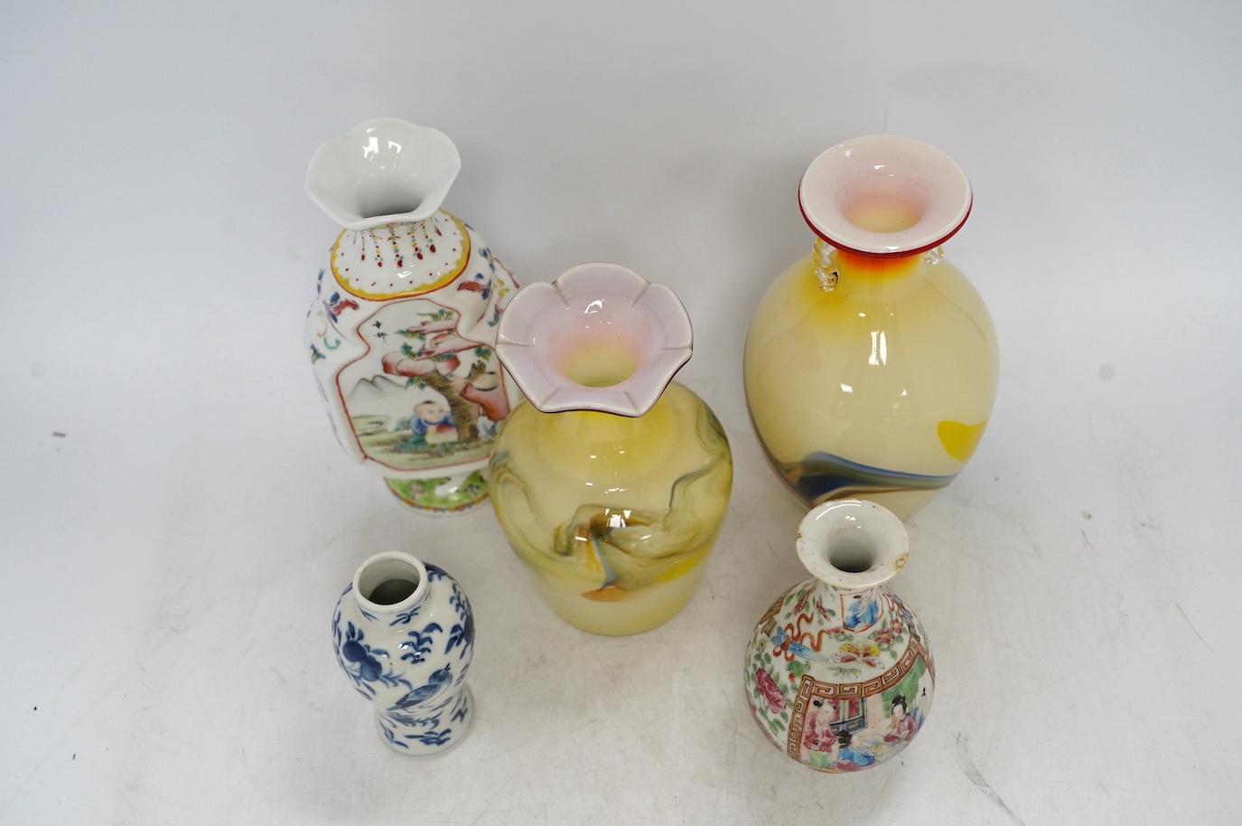 Two Dalian glass vases and three Chinese porcelain vases, 19th/20th century, tallest 19.5cm. Condition - fair
